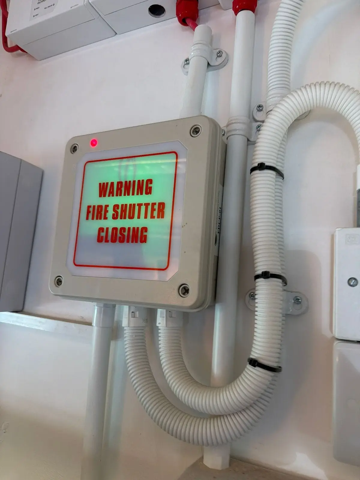 Fire shutter warning light unit reading warning fire shutter closing